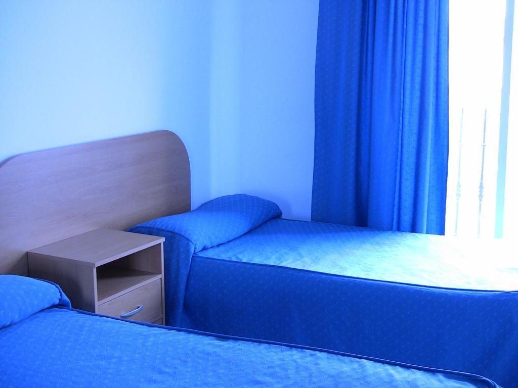 Apartahotel Los Hermanos Ocaña Стая снимка