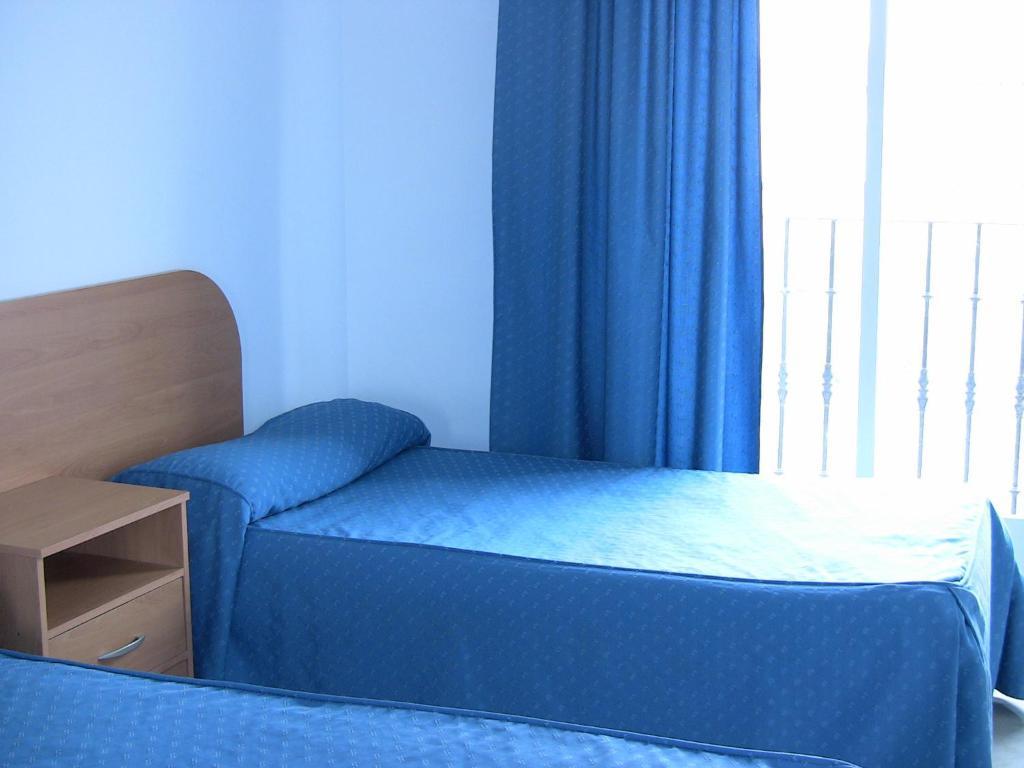 Apartahotel Los Hermanos Ocaña Стая снимка